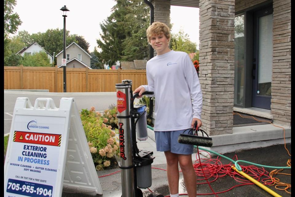 Hudson with his Tucker pure-water cart